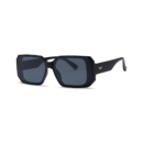Black oversized square sunglasses with dark lenses and a small gold logo on the temple, side view.